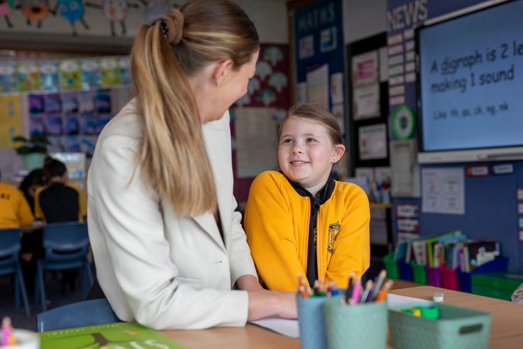 students working with teacher