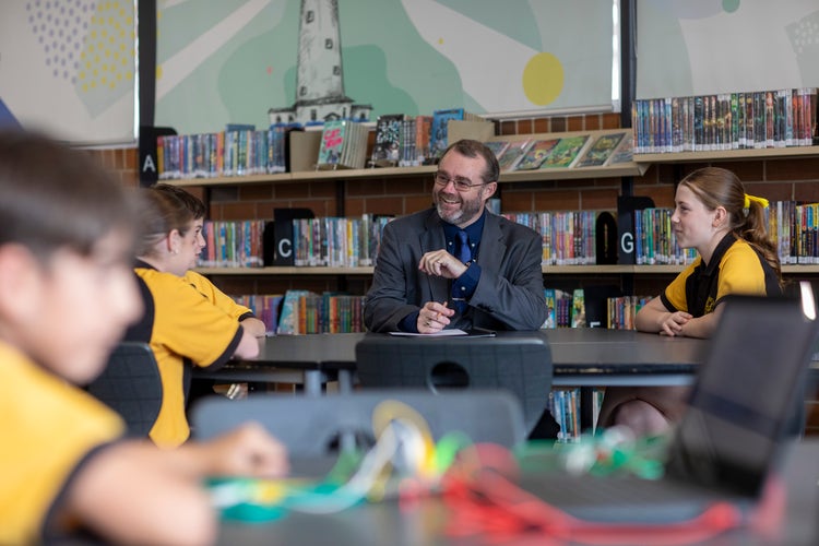 teacher with group of students